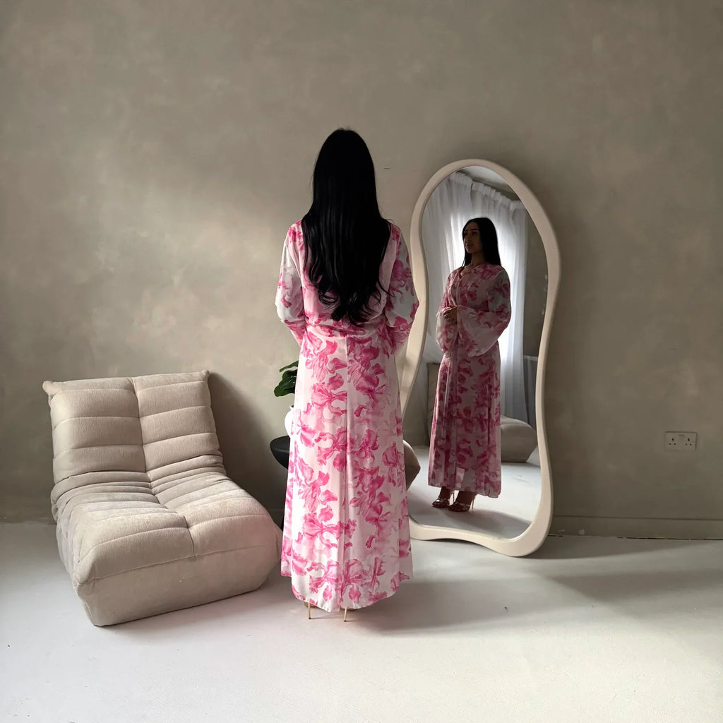 Women's elegant backless floral-lined summer dress with tie-up details